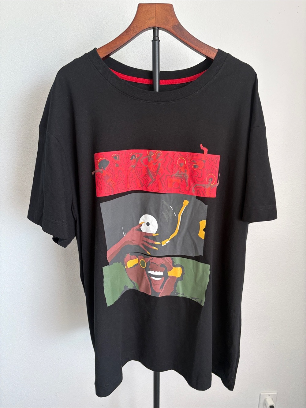 Men's Black Short-Sleeve Graphic Tee with Red, Green and Yellow Print